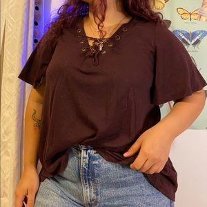 Burgundy tie top with beautiful detailing on back.